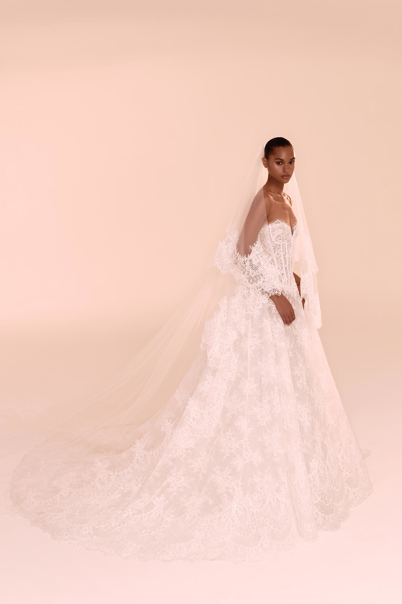 Zuhair Murad Mariage Fall 2026 Look 27 strapless lace ball gown wedding dress with long veil and dramatic train
