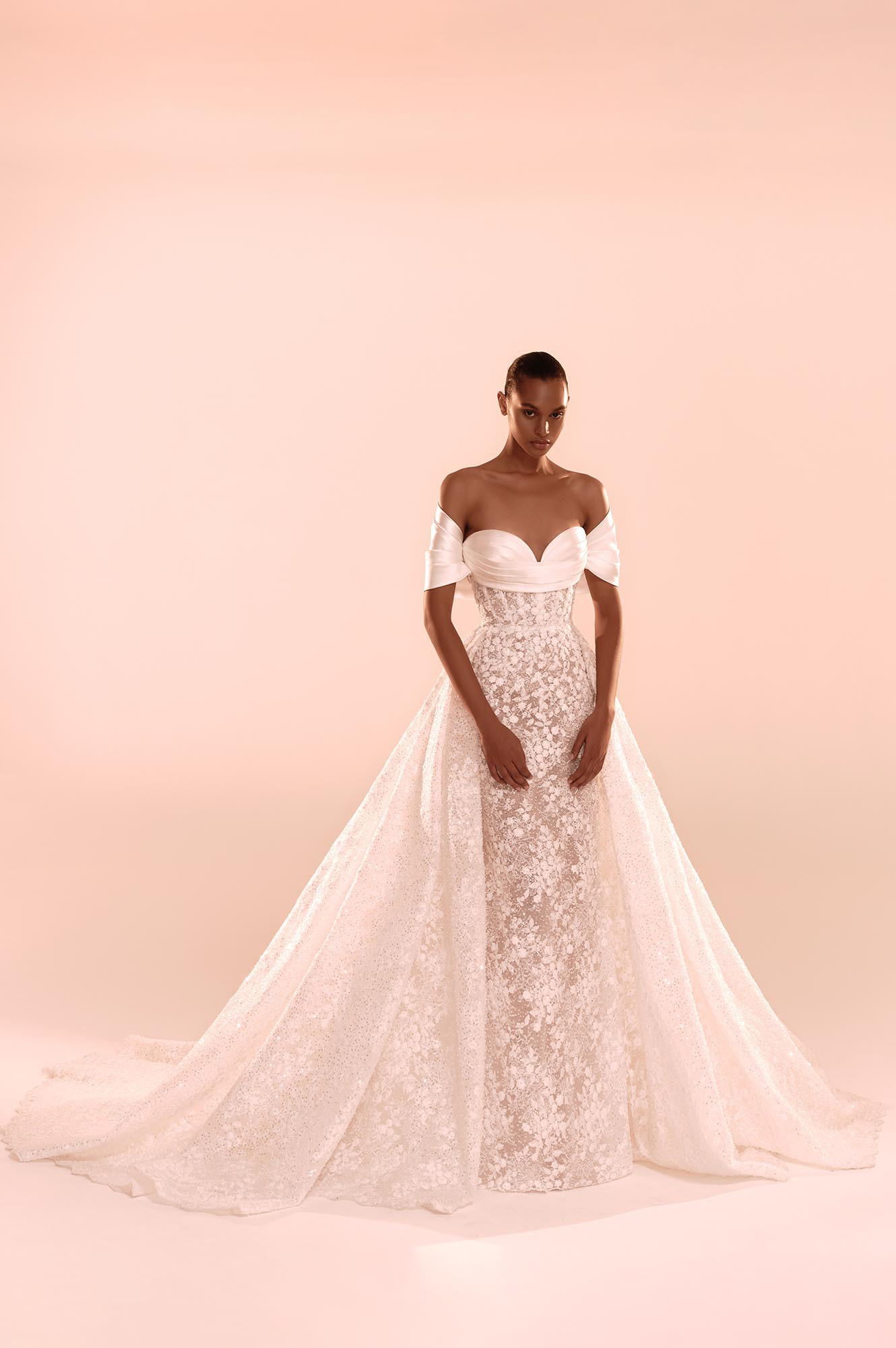 Zuhair Murad Mariage Fall 2026 Look 25 off-shoulder lace wedding dress with satin draped neckline and detachable overskirt