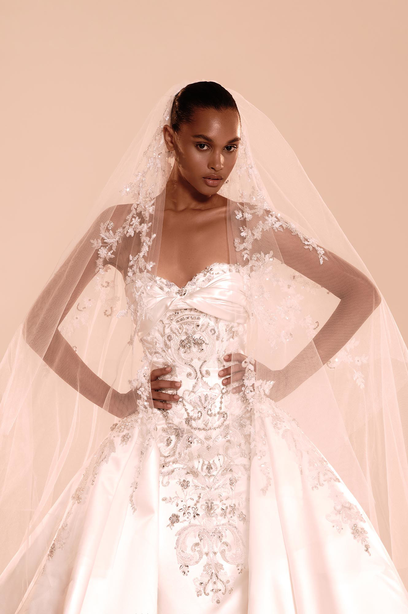 Zuhair Murad Mariage Fall 2026 Look 17 high-neck lace wedding dress with detachable overskirt and cathedral veil